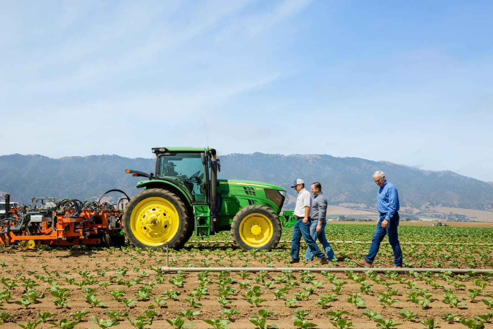 John Deere equipment working a Central Coast field