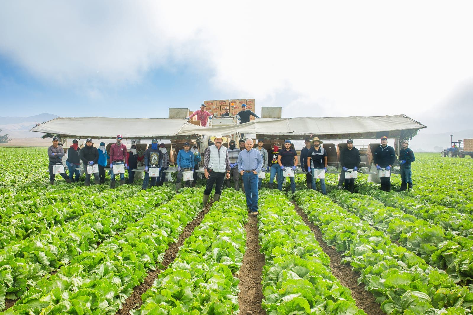 Farm crew gathered in the field